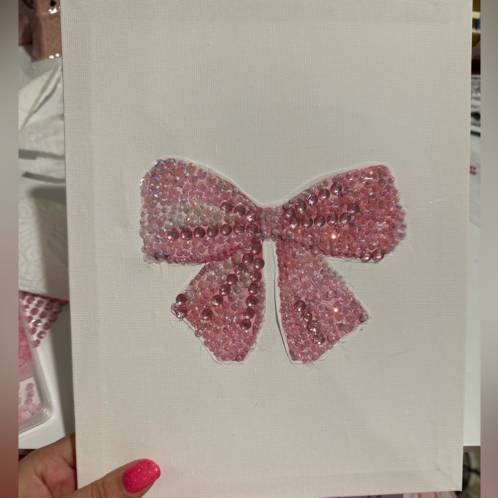 Rhinestone bow on a canvas 8x10